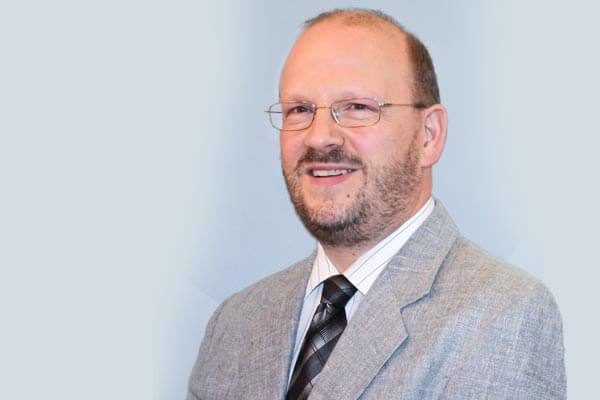 Porträtfoto von Dr. Andreas Henning, Schulzweigkoordinator Informatik